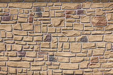 Foto von einer Wand mit Relief Steinmustern