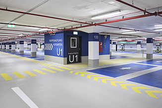 Foto einer frisch sanierten Tiefgarage mit Beschichtung